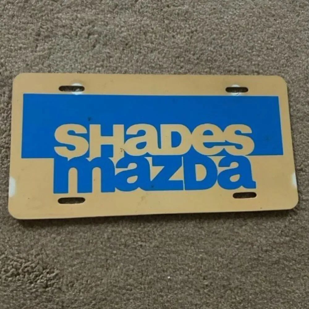 Shades Mazda Plastic Booster License Plate